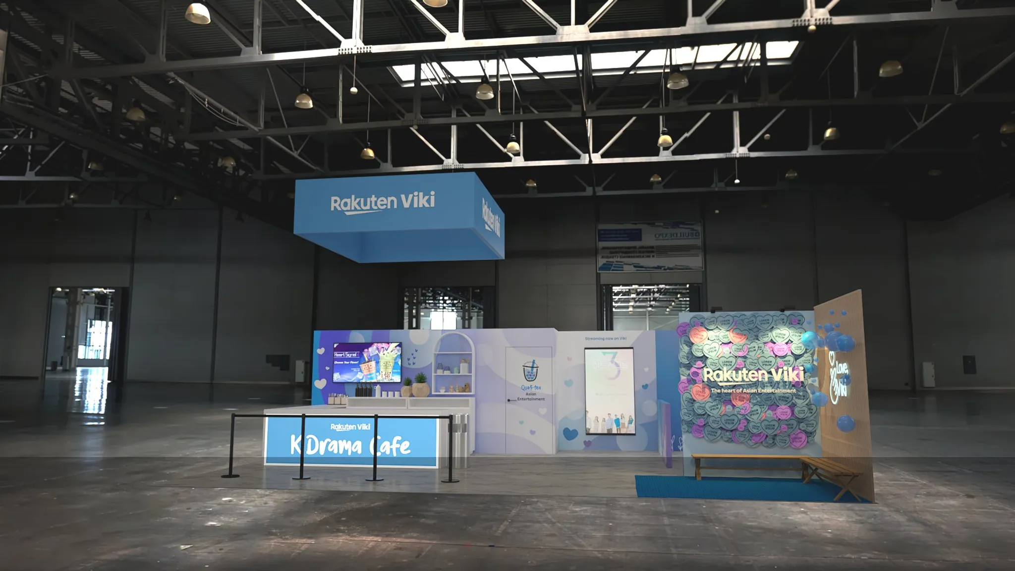 30x50 booth with bold back wall and lounge areas